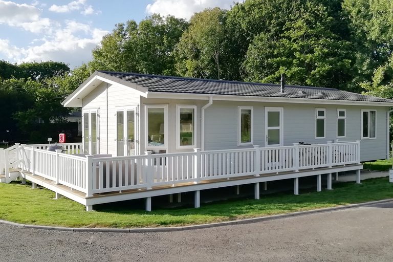 Exterior of Mo's Keep holiday lodge for respite breaks at Shorefield Country Park