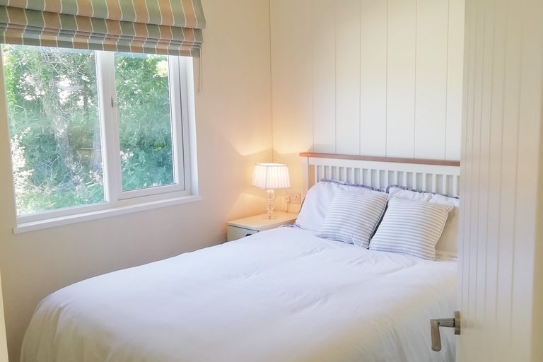 Double bedroom in Mo's Keep lodge, respite break accommodation at Shorefield