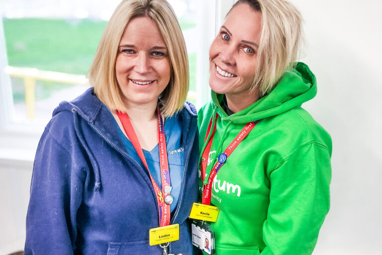 A Family Support Worker with one of Momentum's hospital ambassadors.