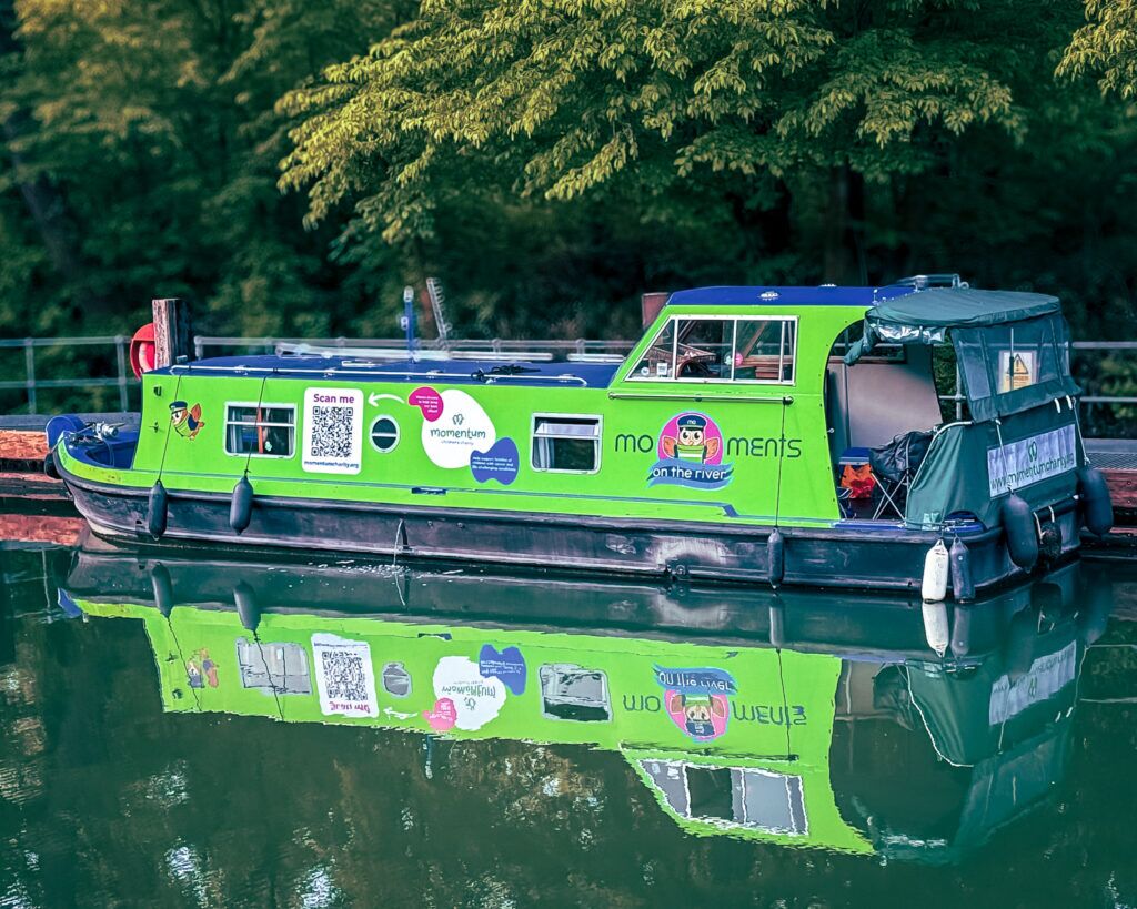 The Momentum Children's Charity boat moored at the marina.