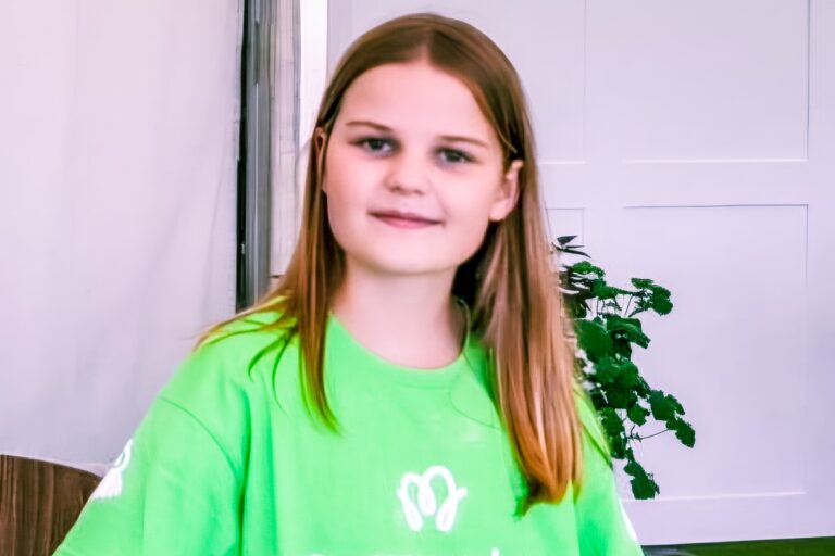A Momentum Young Ambassador in her charity t-shirt