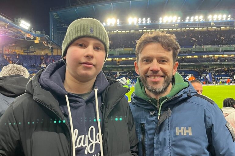 Child and dad at Chelsea Football Club's stadium