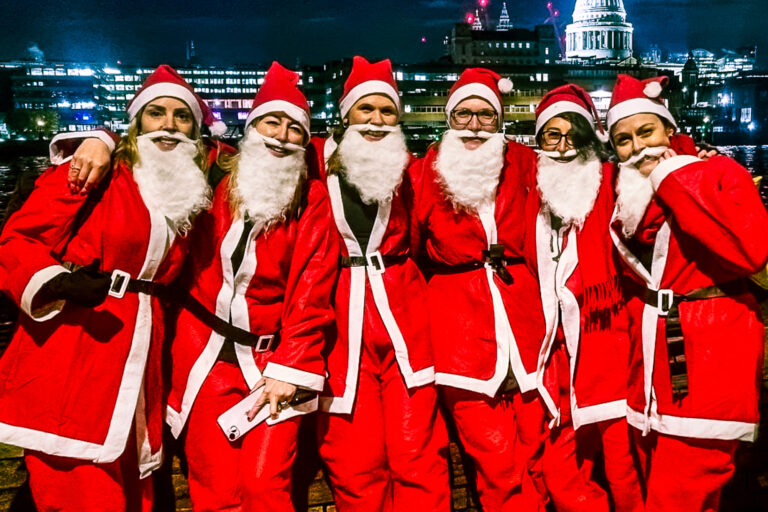 Runners dressed up as Santa for the Santa in the City fun run, raising money for Momentum Children's Charity